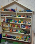 تصویر استند اسباب بازی کودک رنگی 