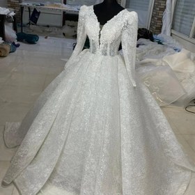 تصویر لباس عروس دو کلوش با پارچه تمام کار شده دانتل فرانسه Bride dress