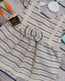 تصویر پیراهن نخی دخترانه راه راه سایز کوچک 