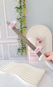 تصویر لولر برش دهنده ی کیک 