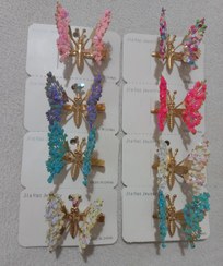 تصویر گیره نوستالژی انبری پروانه ای لرزان 