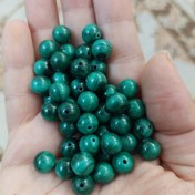 تصویر مهره سنگ مالاکیت اصل وارداتی از کنگو سایز بین ۷و ۸سنگ طبیعی 