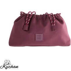 تصویر کیف لوازم آرایش کیسه‌ای از کالکشن کالت بیوتی X هاش ادیت 