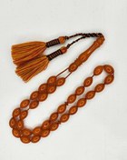 تصویر تسبیح کهربا رگه دار 33عددی تراش هلی خوشدست رنگ نارنجی زیبا 