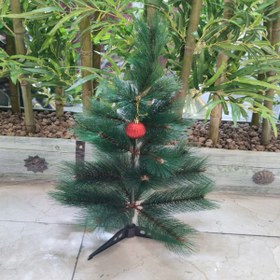 تصویر درخت کاج سوزنی کریسمس مصنوعی مدل 60 سانت سبز و نوک برفی 