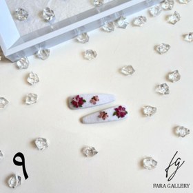 تصویر گیره تق تقی گلدوزی شده 