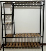 تصویر رگال بغل طبقه کد ۱۰۱۰ مشکی و سفید و طلایی 