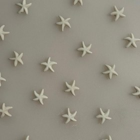 تصویر مهره دیزاین مو مدل صدف ستاره‌ای 