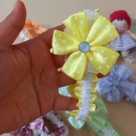 تصویر تل کشی هدبند نوزادی 