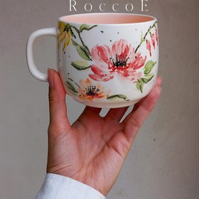 تصویر ماگ سرامیکی دستساز طرح گل نیلوفر Handmade ceramic mug flower design