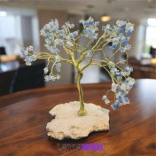 تصویر درخت زندگی عقیق آبی بر بستر کلسیت 