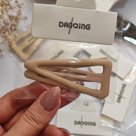 تصویر تق تقی مثلثی درشت 