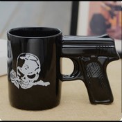 تصویر ماگ دسته تفنگی دکوری طرح اسلحه کلت | طرح اسکلت و گل 