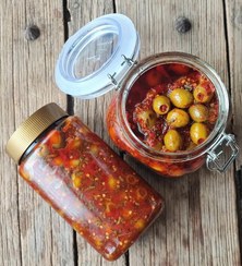 تصویر زیتون مزه دار شده در فلفل (بسته ۷۵۰ گرمی) 