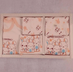 تصویر فروشگاه لباس نوزاد و کودک نی نی ماه