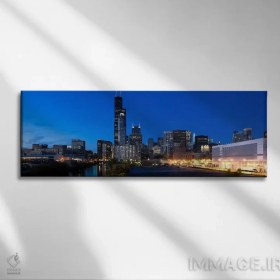 تصویر تابلو دکوراتیو Chicago, Illinois, USA,ساختمان ها در شهر روشن هنگام غرو… اثر پانورامیک ایمجز - بوم گالری ایماژ / 120x40 / بوم کلاف‌شده Buildings in a city lit up at dusk BY Panoramic Images