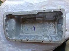 تصویر کارتل روغن پژو ۲۰۰۰ 