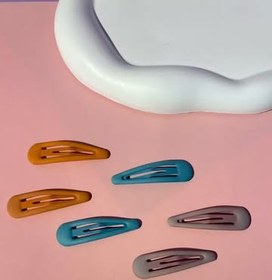 تصویر گیره موی تق‌تقی - یاسی 