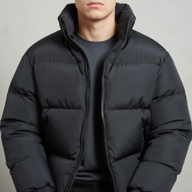 تصویر کاپشن استوک پر پُفی مشکی OCCASIO (اورجینال کره)؛ گرم، سبک و مینیمال 