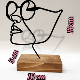 تصویر مجسمه مینیمال طرح دختر 