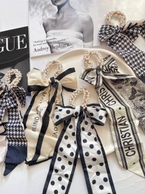 تصویر کش پاپیون مرواریدی 