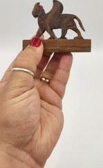 تصویر مجسمه چوبی نقوش ایران باستان 