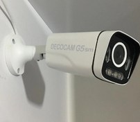 تصویر دوربین مداربسته IP تحت شبکه 5 مگاپیکسل بورد 335سونی استارلایت کینگ سایز Decocam G5s (حرفه ای) با گارانتی 24 ماهه - 5 مگاپیکسل با بورد 335 سونی استارلایت کینگ سایز حرفه ای دارای میکروفون DecoCam IP Camera ( Professional ) G5 MP 335 SONY . KING SIZE . 8 ARRAY. STAR LIGHT