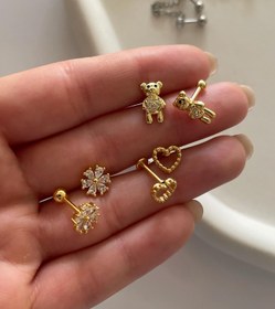 تصویر پیرسینگ گوش و بینی استیل 