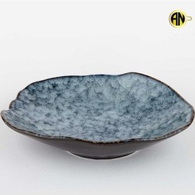 تصویر بشقاب گود دفرمه بزرگ 