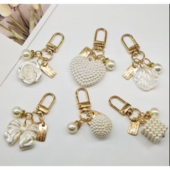 تصویر جاکلیدی فانتزی گل و پاپیون 