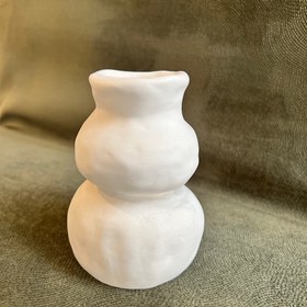 تصویر گلدان دکوری فنری دفرمه 