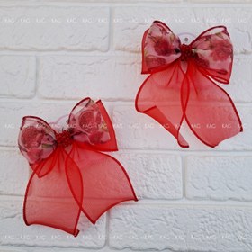 تصویر گیره پاپیون حریر دنباله دار نگین دار طرح انار یلدایی 