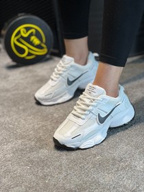 تصویر کفش کتونی اسپرت نایک (Nike) مدل AID زنانه و دخترانه رنگ سفید طوسی Nike AID