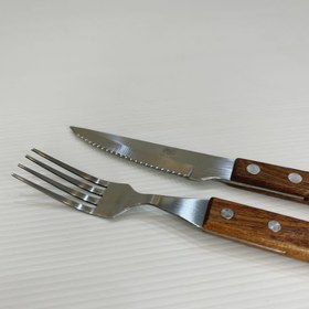 تصویر چنگال دسته چوبی 