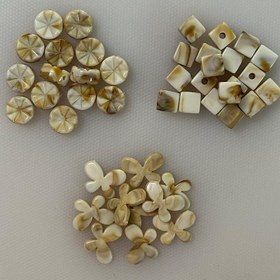 تصویر مهره بین کاری طرح سنگ پروانه و مکعب و گرد 