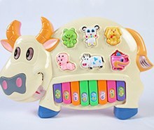 تصویر اسباب بازی ارگ گاو موزیکال ا Musical cow organ toy Musical cow organ toy