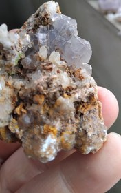 تصویر فلوئوریت با همرشدی کوارتز 