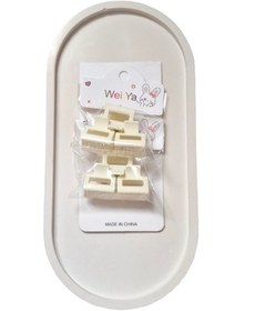 تصویر گیره سه تایی کوچک کرم 