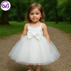 تصویر دامن تور سفید خالخالی برای۳تا۱۴سال 