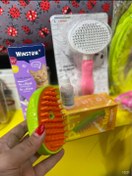 تصویر برس سیلیکونی بخاردار شارژی سگ و گربه مدل انبه Pet brush with cold steam