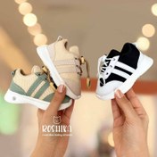 تصویر کفش بچگانه سوتی (جغجغه ای) کیدو 