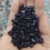 تصویر مهره سنگ دلربای سورمه ای چیپسی دلربای دفرمه تراش نخورده 