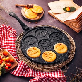 تصویر تابه چدنی pancake نالینو ا تابه چدن پنکیک نالینو با قطر 30 سانتی متر دارای ۷ قسمت مجزا امکان پخت ۷ عدد پنکیک همزمان را به شما میدهد. نکته جالب این پنکیک پز دارای شکلک هایی است که در هنگام پخت روی مواد می اندازد که فرم فانتزی به پنکیک میدهد. تابه چدن پنکیک پز را میتوان برای پختن غذاهایی از جمله : کوکو کتلت املت نیمرو و انواع نان استفاده کرد. تابه چدن پنکیک نالینو با قطر 30 سانتی متر دارای ۷ قسمت مجزا امکان پخت ۷ عدد پنکیک همزمان را به شما میدهد. نکته جالب این پنکیک پز دارای شکلک هایی است که در هنگام پخت روی مواد می اندازد که فرم فانتزی به پنکیک میدهد. تابه چدن پنکیک پز را میتوان برای پختن غذاهایی از جمله : کوکو کتلت املت نیمرو و انواع نان استفاده کرد.