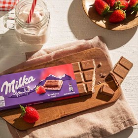 تصویر شکلات تابلت میلکا با مغز توت فرنگی (100 گرم) milka شکلات و فرآورده های کاکائویی میلکا 100