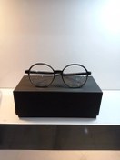 تصویر عینک طبی گرد مشکی بلوکات 