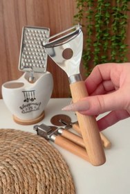 تصویر پوست کن کمانی دسته چوبی 