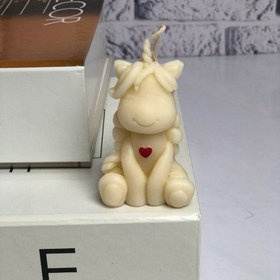 تصویر شمع مدل گیفت یونیکورن 