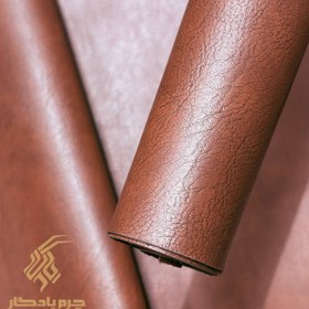 تصویر چرم مصنوعی رنگ عسلی طرح رگه دار - ۵۰*۱۴۰سانتیمتر (نیم متر ) 