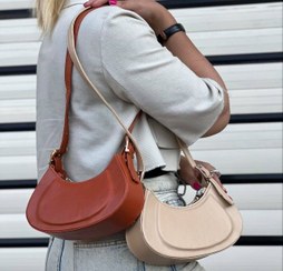 تصویر کیف هلال زنانه صورتی | کیف رودوشی دخترانه شیک و ترند 2025 - کرم 