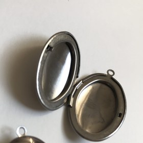 تصویر لاکت بیضی استیل 4*3 سانتی 